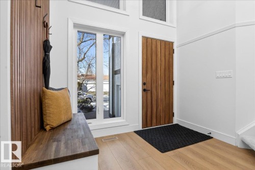 Entryway featuring wood finished floors - 218 Omand Drive, Edmonton, AB 