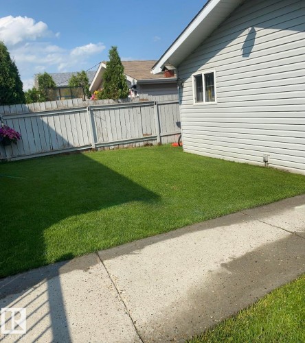 View of fenced yard - 3015 49, Beaumont, AB - Outdoor