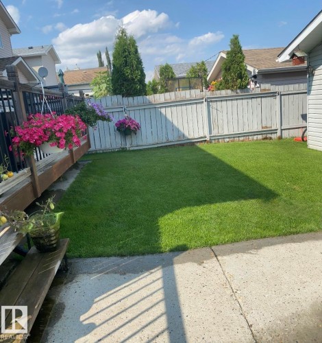 View of fenced backyard - 3015 49, Beaumont, AB - Outdoor