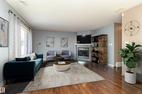 5818 47 Avenue, Beaumont, AB - Indoor Photo Showing Living Room With Fireplace