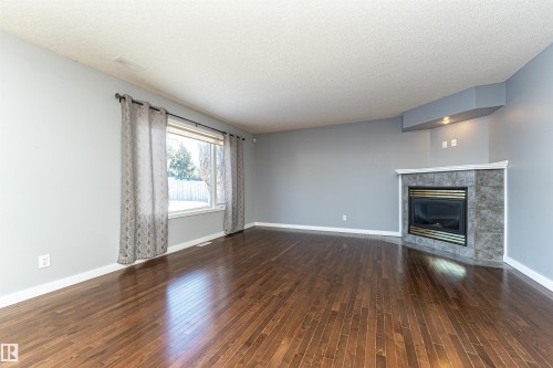 5818 47 Avenue, Beaumont, AB - Indoor Photo Showing Other Room With Fireplace