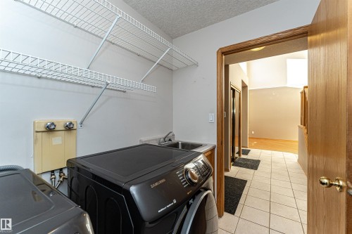 5818 47 Avenue, Beaumont, AB - Indoor Photo Showing Laundry Room