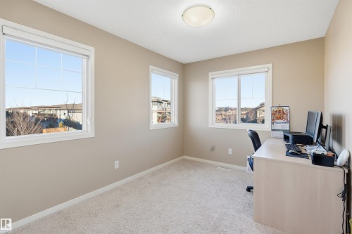 Office with light colored carpet and a textured ceiling - 5003 Andison Close, Edmonton, AB - Indoor Photo Showing Office