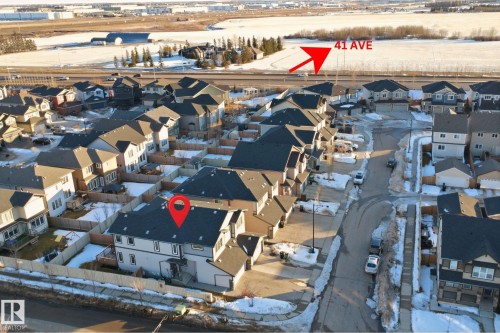 Snowy aerial view featuring a residential view - 5003 Andison Close, Edmonton, AB - Outdoor With View