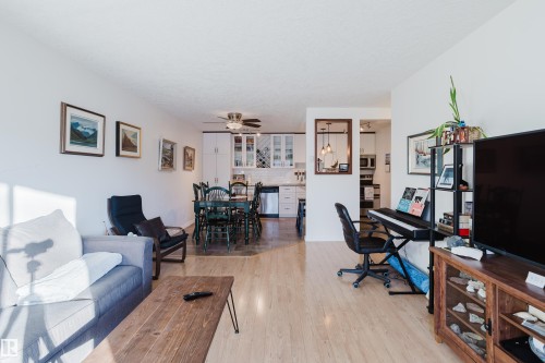 Office featuring light wood-type flooring and a ceiling fan - 115 10545 Saskatchewan Drive, Edmonton, AB - Indoor
