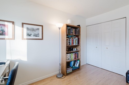 Office with baseboards and light wood-type flooring - 115 10545 Saskatchewan Drive, Edmonton, AB - Indoor