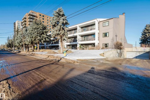 This unit is on the ground level, closest to the parkade. - 115 10545 Saskatchewan Drive, Edmonton, AB - Outdoor With Facade