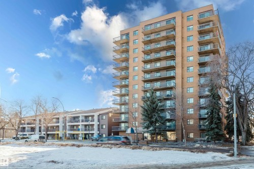 Snow covered building with a view of apartment building / complex - 115 10545 Saskatchewan Drive, Edmonton, AB - Outdoor With Facade