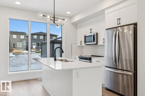 7460 Klapstein Crescent, Edmonton, AB - Indoor Photo Showing Kitchen With Double Sink With Upgraded Kitchen