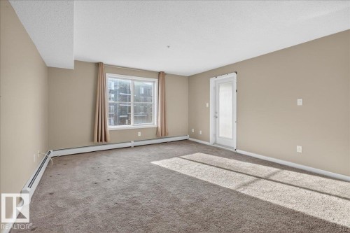 213 1070 Mcconachie Boulevard, Edmonton, AB - Indoor Photo Showing Other Room