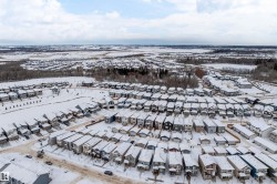 Snowy aerial view with a residential view - 
