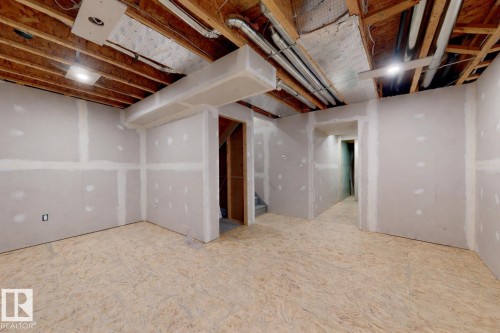 View of unfinished below grade area - 1030 177A Street, Edmonton, AB - Indoor Photo Showing Basement