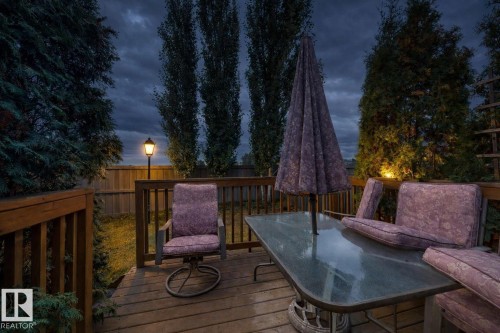 Wooden deck featuring outdoor dining space - 1030 177A Street, Edmonton, AB - Outdoor With Deck Patio Veranda