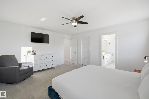 Bedroom featuring light carpet and ceiling fan - 30 Willow Link, Fort Saskatchewan, AB - Indoor Photo Showing Bedroom
