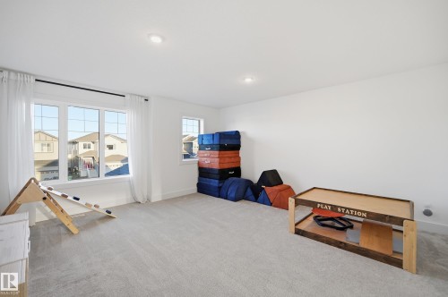 Game room with carpet floors and recessed lighting - 30 Willow Link, Fort Saskatchewan, AB - Indoor Photo Showing Other Room