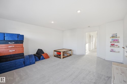 Recreation room featuring carpet and recessed lighting - 30 Willow Link, Fort Saskatchewan, AB - Indoor