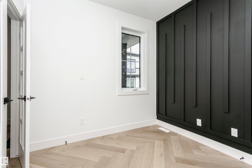 Unfurnished room with baseboards and parquet floors - 3248 Pelerin Crescent, Beaumont, AB - Indoor Photo Showing Other Room