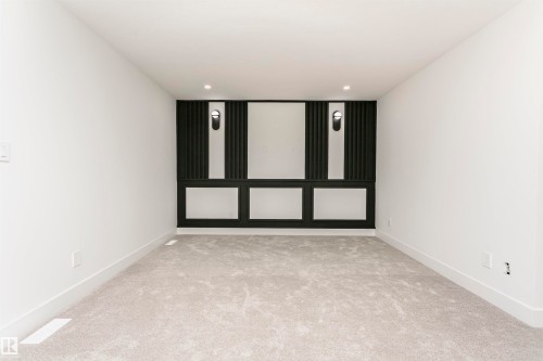 Spare room with light carpet and recessed lighting - 3248 Pelerin Crescent, Beaumont, AB - Indoor Photo Showing Other Room