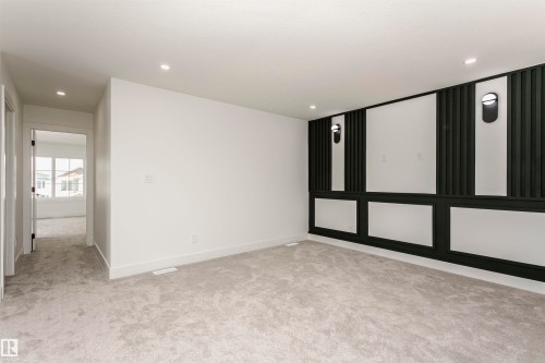 Unfurnished room with light colored carpet and recessed lighting - 3248 Pelerin Crescent, Beaumont, AB - Indoor Photo Showing Other Room