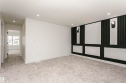 Unfurnished room with light colored carpet and recessed lighting - 