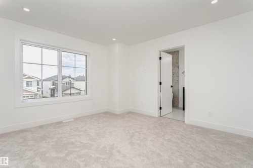 Empty room with light carpet and recessed lighting - 3248 Pelerin Crescent, Beaumont, AB - Indoor Photo Showing Other Room