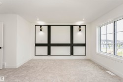 Unfurnished room featuring light carpet and recessed lighting - 
