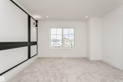 Unfurnished room with light carpet and recessed lighting - 3248 Pelerin Crescent, Beaumont, AB - Indoor Photo Showing Other Room