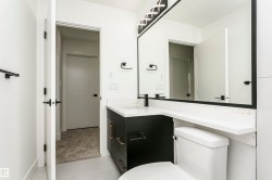 Half bath with vanity and toilet - 