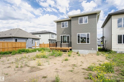 Back of house with a deck - 3248 Pelerin Crescent, Beaumont, AB - Outdoor With Deck Patio Veranda With Exterior