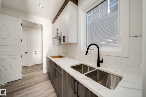 7023 177 Avenue, Edmonton, AB - Indoor Photo Showing Kitchen With Double Sink