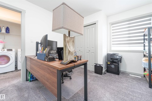 Home office with light colored carpet - 2330 Kelly Circle, Edmonton, AB - Indoor Photo Showing Laundry Room
