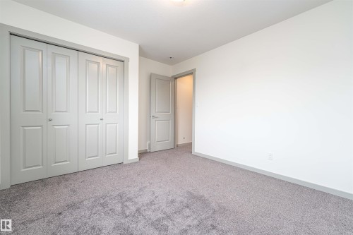 Unfurnished bedroom with carpet and a closet - 2330 Kelly Circle, Edmonton, AB - Indoor Photo Showing Other Room