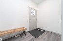 Entryway featuring light wood-style flooring - 2330 Kelly Circle, Edmonton, AB  - Indoor Photo Showing Other Room 