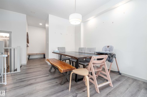 Dining room with recessed lighting and light wood-style floors - 2330 Kelly Circle, Edmonton, AB - Indoor Photo Showing Dining Room