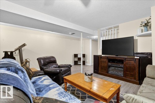 115 Birch Drive, Gibbons, AB - Indoor Photo Showing Living Room