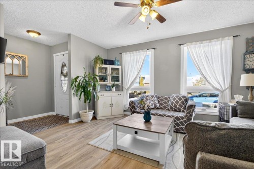 115 Birch Drive, Gibbons, AB - Indoor Photo Showing Living Room