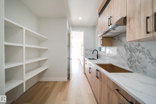 7027 177 Avenue, Edmonton, AB - Indoor Photo Showing Kitchen With Double Sink