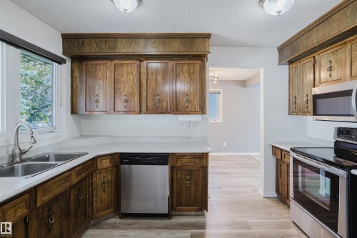 4102 43A Avenue, Leduc, AB - Indoor Photo Showing Kitchen With Double Sink
