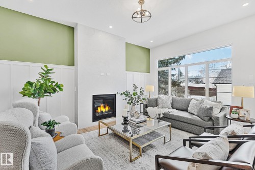 11234 61 Street, Edmonton, AB - Indoor Photo Showing Living Room With Fireplace
