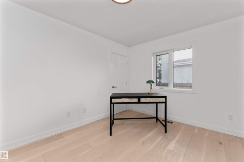 Office area featuring light wood finished floors and baseboards - 607 Butterworth Wynd, Edmonton, AB - Indoor Photo Showing Other Room