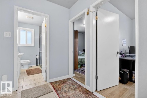 Full bath with a shower stall and toilet - 13320 123 Street, Edmonton, AB - Indoor