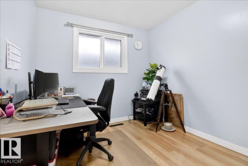 Office area featuring light wood-type flooring and baseboards - 13320 123 Street, Edmonton, AB - Indoor Photo Showing Office