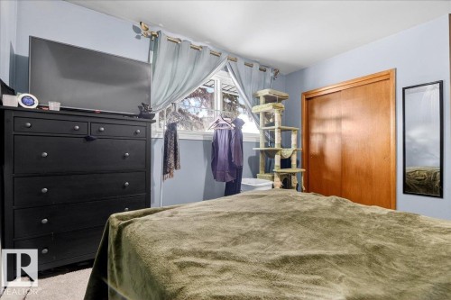 Bedroom with a closet - 13320 123 Street, Edmonton, AB - Indoor Photo Showing Bedroom