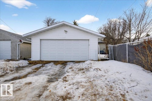Snow covered garage featuring a detached garage - 13320 123 Street, Edmonton, AB - Outdoor With Exterior