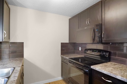 335 6076 Schonsee Way, Edmonton, AB - Indoor Photo Showing Kitchen
