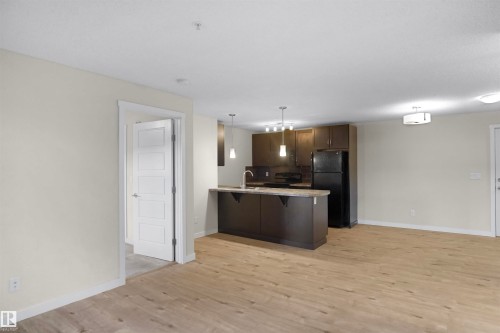 335 6076 Schonsee Way, Edmonton, AB - Indoor Photo Showing Kitchen