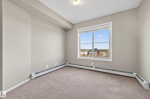 404 5370 Chappelle Road, Edmonton, AB - Indoor Photo Showing Other Room