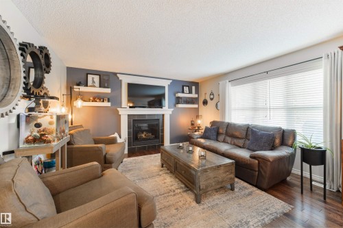8504 16A Avenue, Edmonton, AB - Indoor Photo Showing Living Room With Fireplace