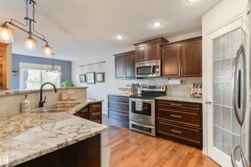 8504 16A Avenue, Edmonton, AB - Indoor Photo Showing Kitchen With Stainless Steel Kitchen With Double Sink