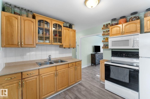 3633 106 Avenue, Edmonton, AB - Indoor Photo Showing Kitchen With Double Sink